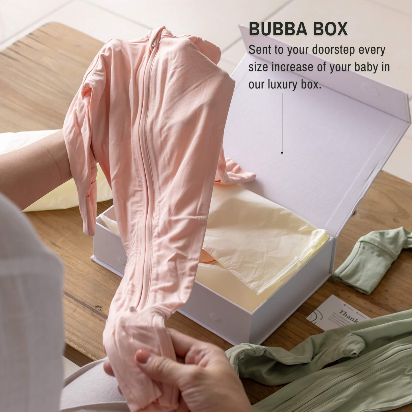 baby bamboo pyjamas being taken out of box