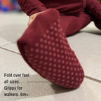 Close up off feet maroon bamboo baby grow