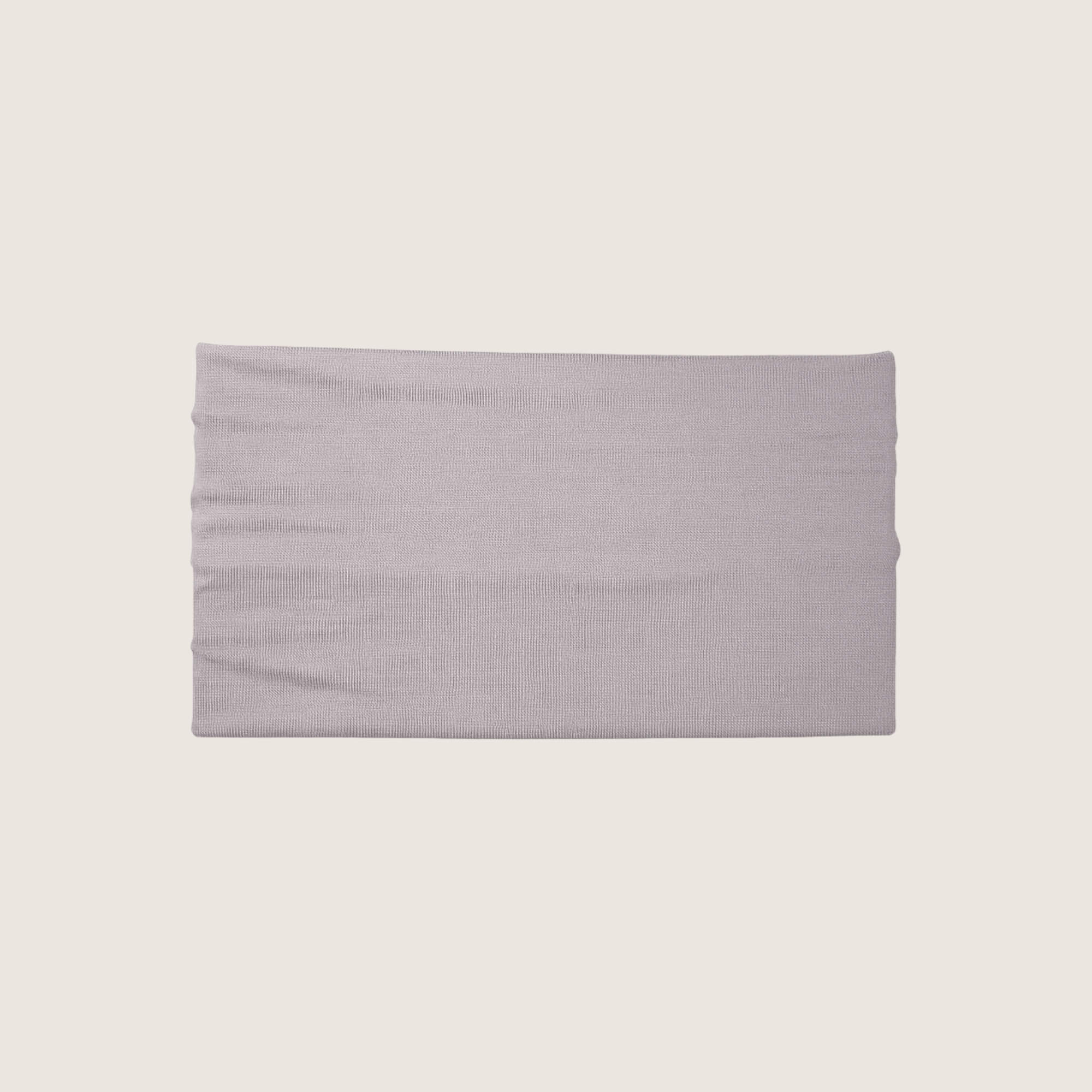 Gray headband on a beige background