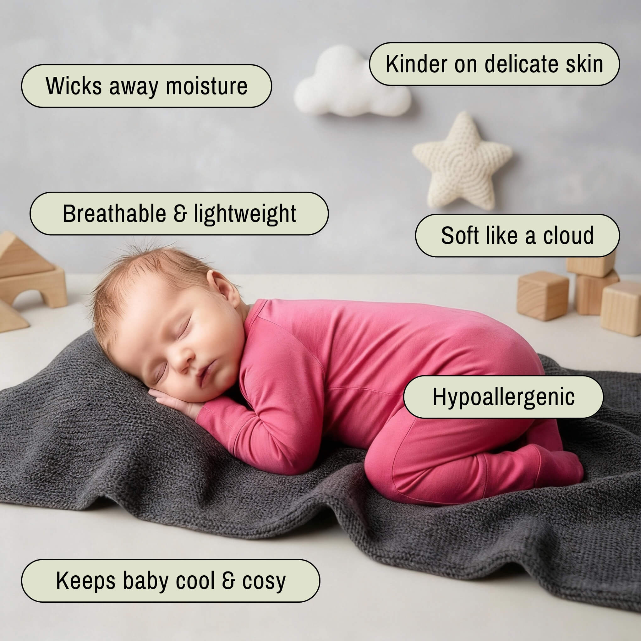 newborn girl wearing pink bamboo babygrow on tummy