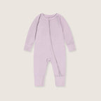 Lavender baby onesie with a zipper on a light gray background