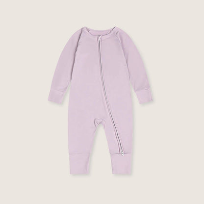 Lavender baby onesie with a zipper on a light gray background