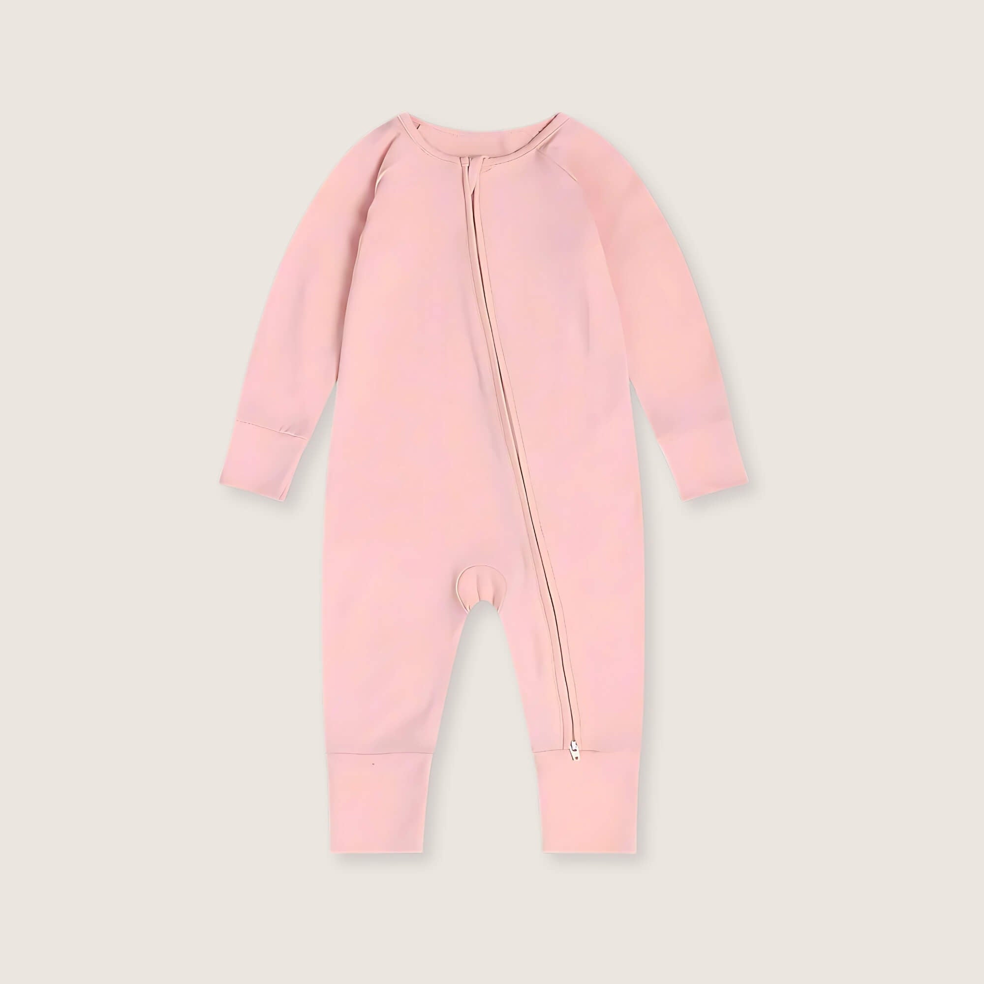 Pink baby onesie with a zipper on a light gray background
